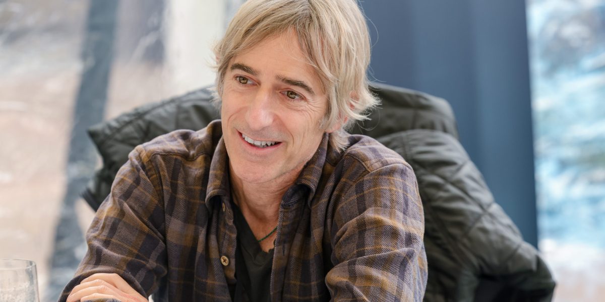 Mark Pincus speaking at a conference about AI and product innovation