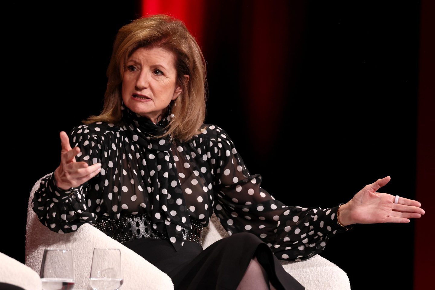 Arianna Huffington speaking about workplace wellbeing and executive burnout