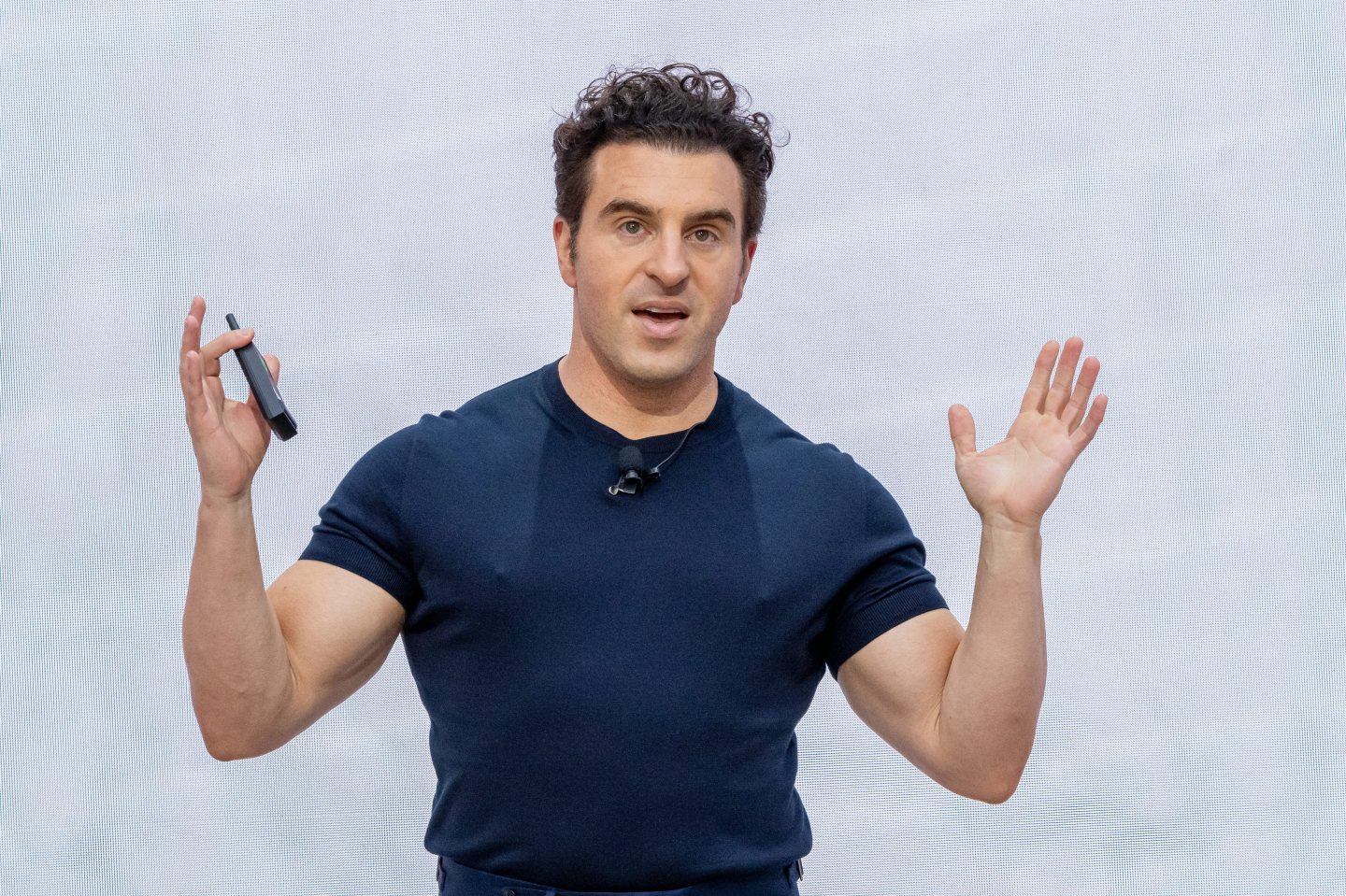 Brian Chesky speaking at an Airbnb investor event