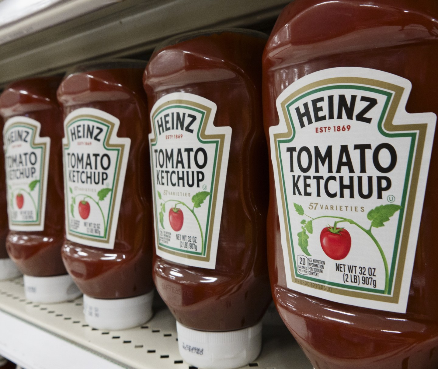 Heinz ketchup bottles displayed on a European supermarket shelf