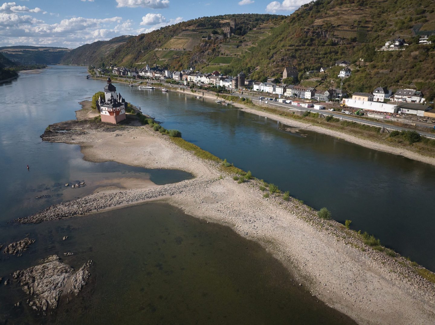 Low water levels on the Rhine river at Kaub exposing riverbed
