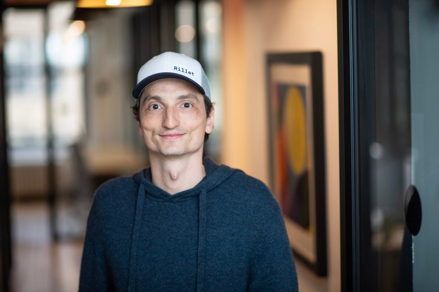 Rillet office with AI-driven accounting dashboard on screen