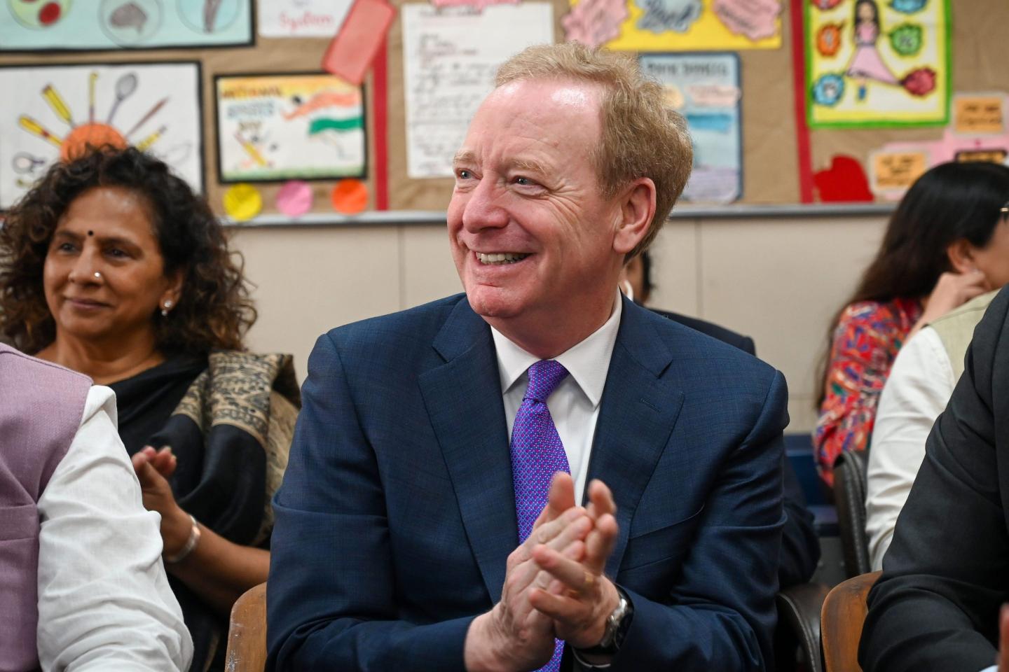 Brad Smith speaking at a press conference in New York City about AI safety standards for schools