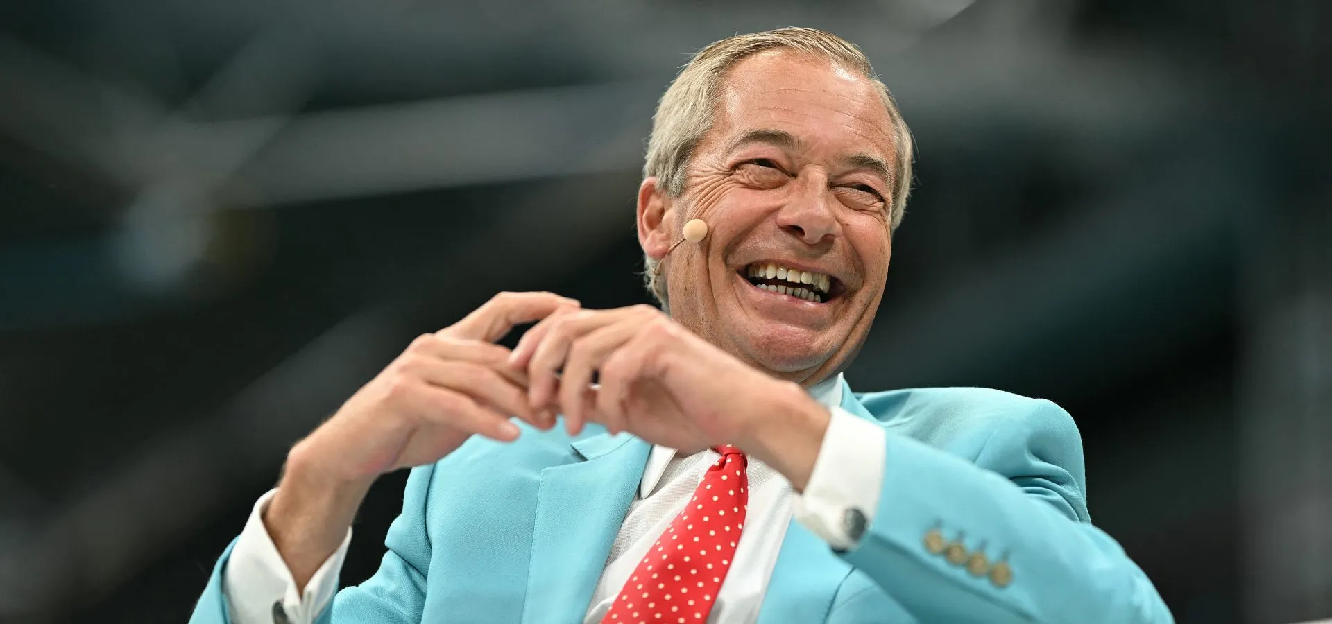 Nigel Farage speaking at Reform UK conference in Birmingham